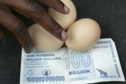 Zimbabwe's $100 billion banknote with the number of eggs it could purchase on its release date