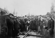 Lord Strathcona drives the last spike of the Canadian Pacific Railway, at Craigellachie, 7 November 1885. Completion of the transcontinental railroad was a condition of BC's entry into Confederation.